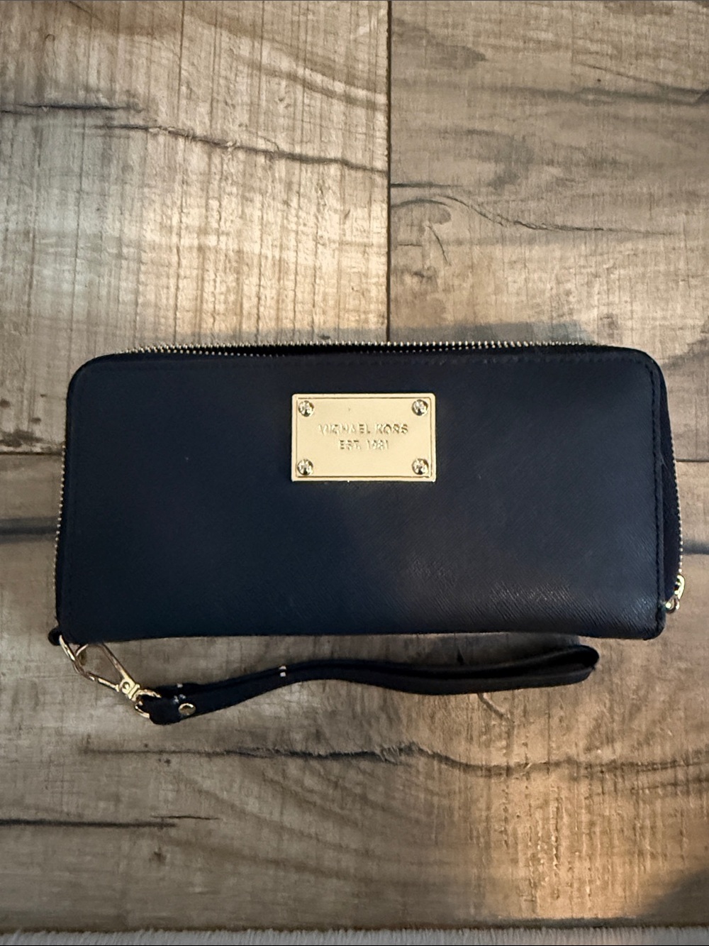 Michael Kors black Zip-Around Wristlet with Gold Plate